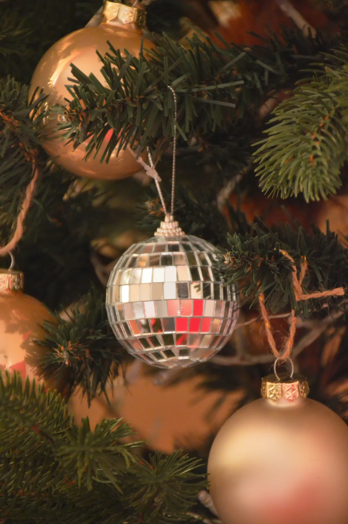 A close up of a christmas tree with ornaments