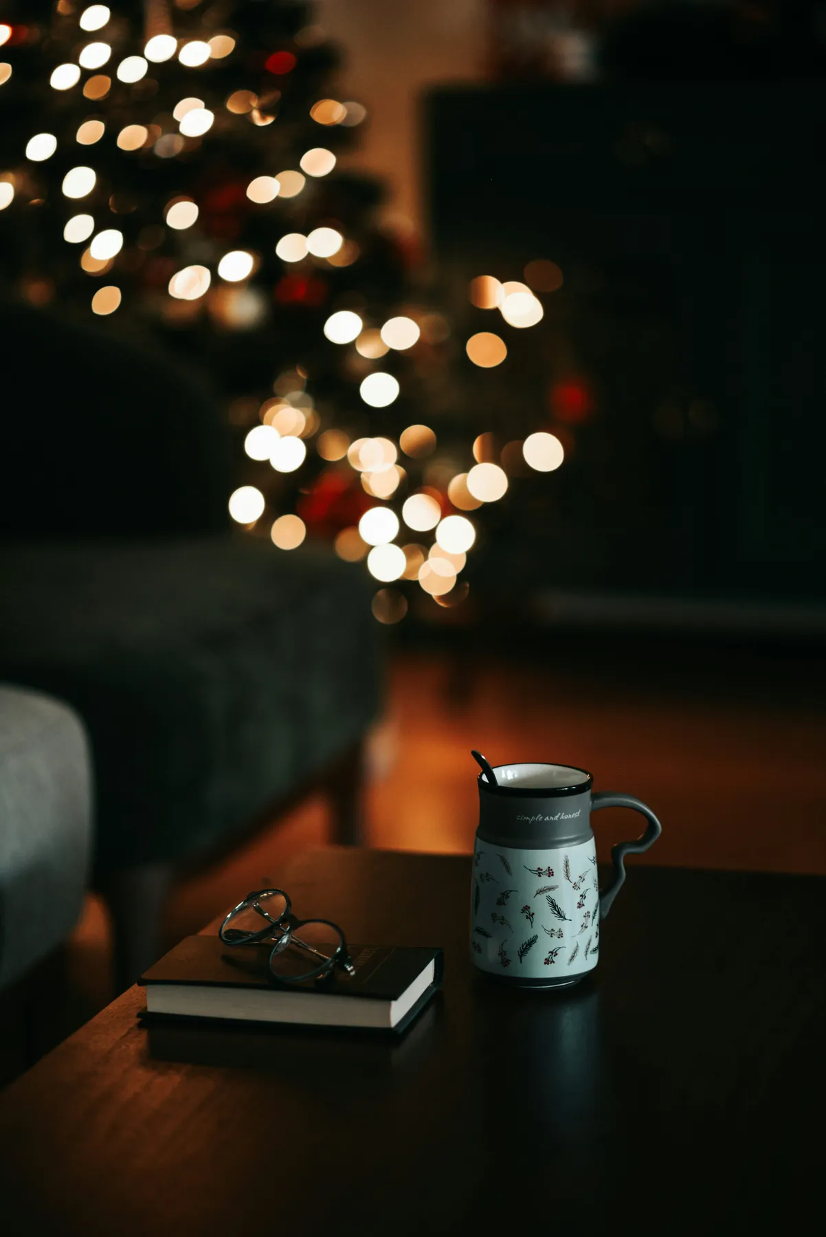 A coffee cup sitting on top of a table next to a book - Free Photo on  Unsplash