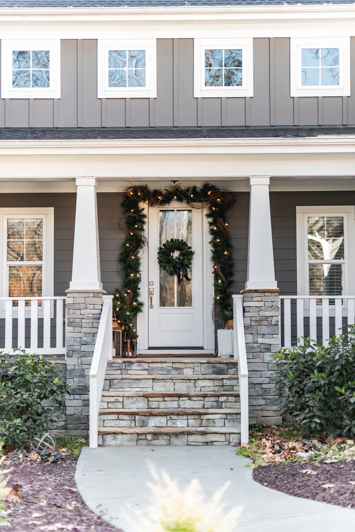 A Copper, Tartan plaid and Boxer-inspired Christmas porch -