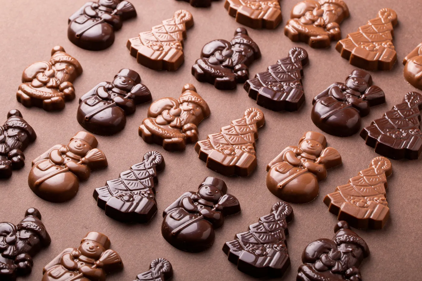 a table topped with lots of chocolate candies