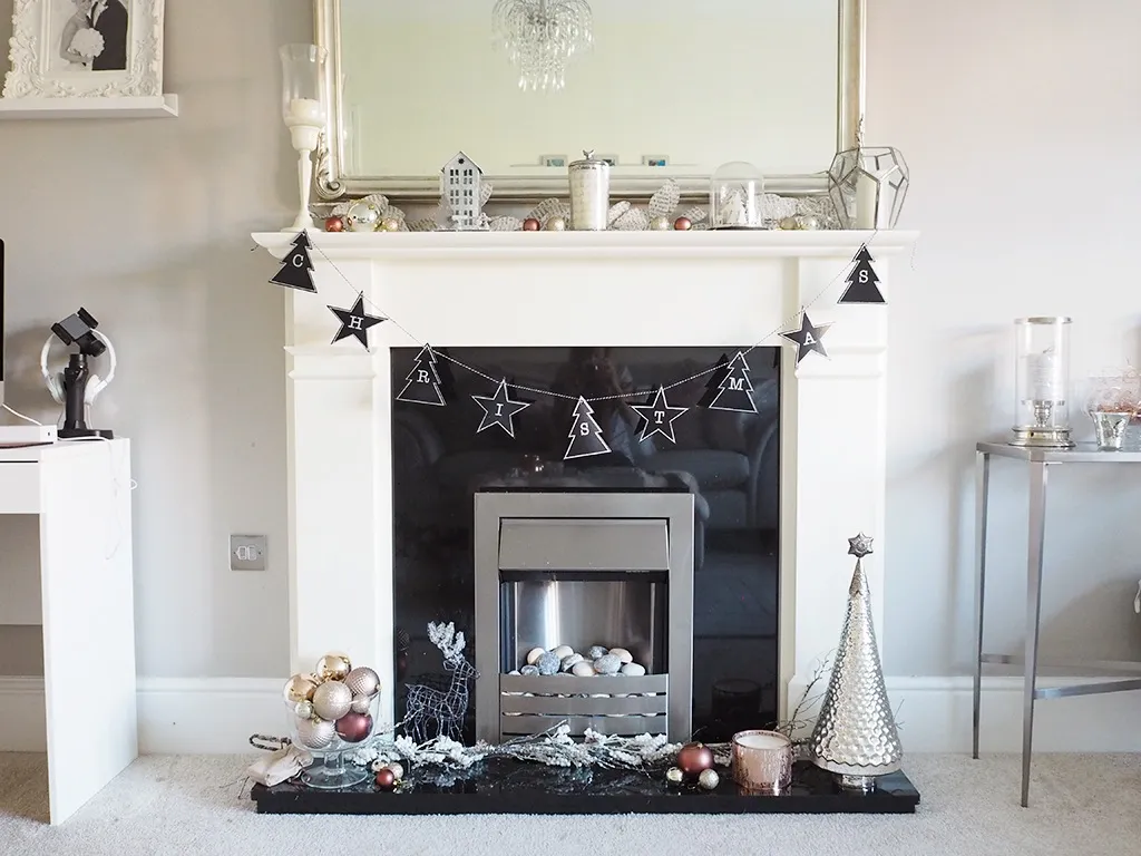 Decorating a Christmas Fireplace Mantel