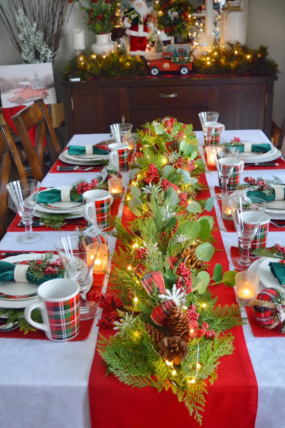Dining Delight: Cozy Plaid Christmas Tablescape with Garland Centerpiece