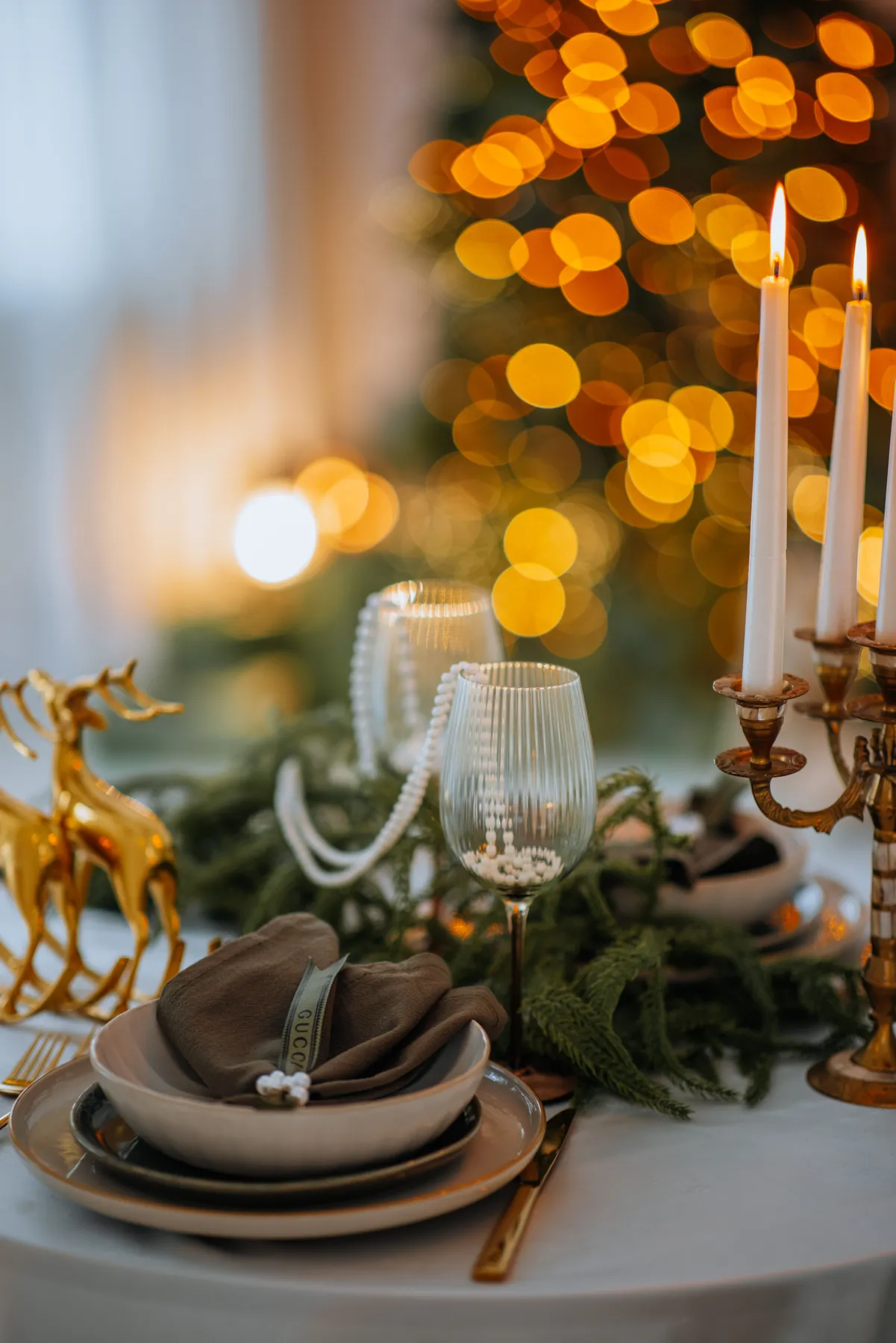 Elegant Holiday Table Setting with Candlelight · Free Stock Photo