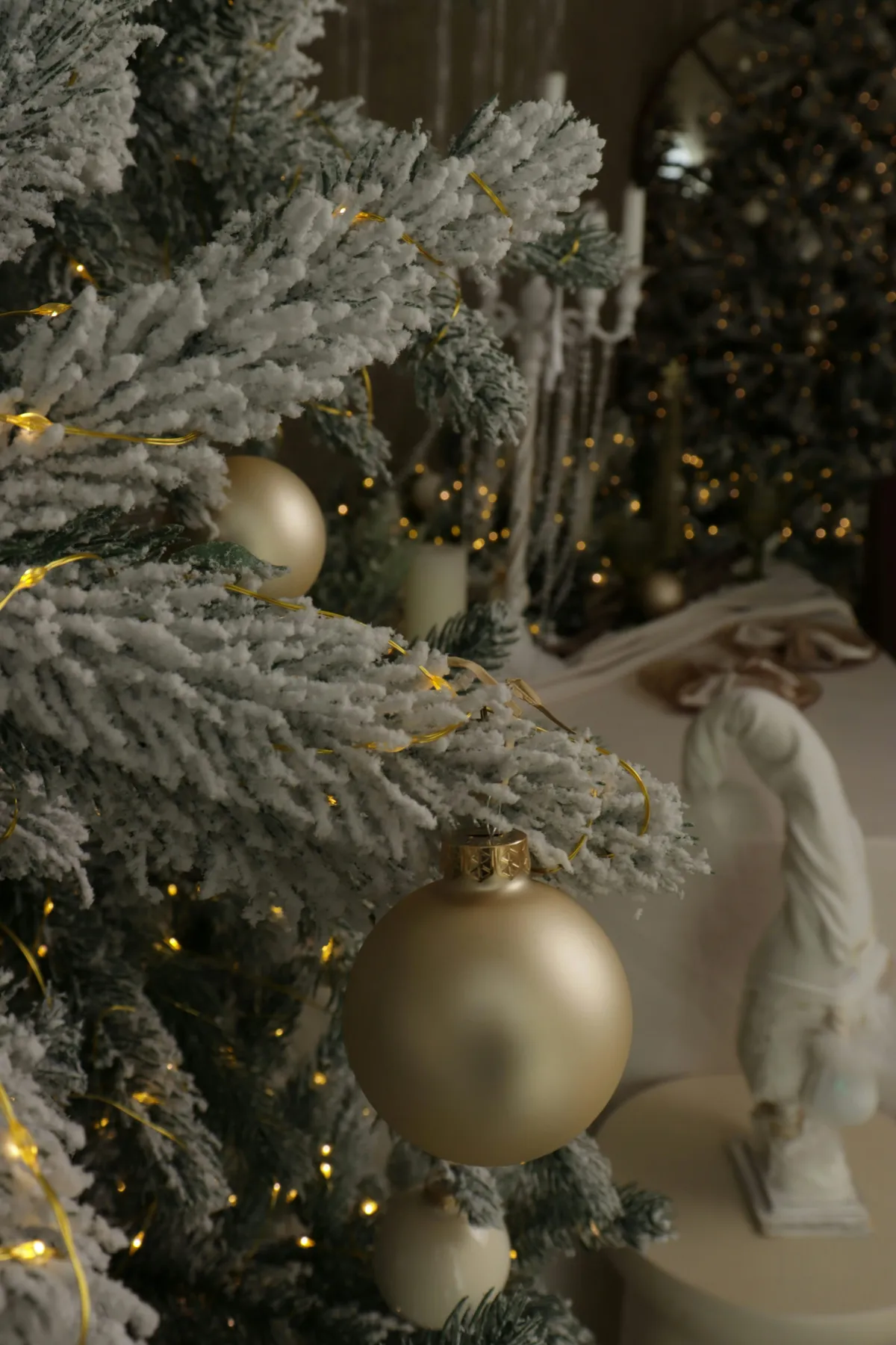Frosted christmas tree with golden ornaments and lights - Free Photo on  Unsplash