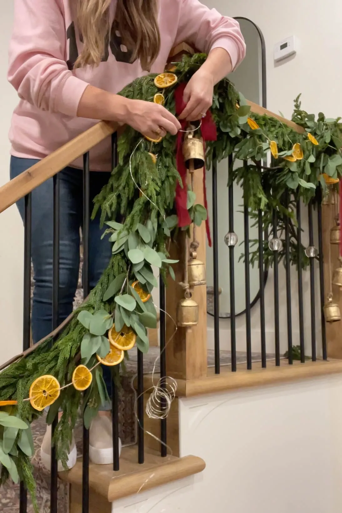 How to Decorate With Christmas Garland on a Staircase | Crystel Montenegro  Home