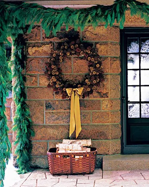 Outdoor Christmas Decorating with Green Garlands and Winter Holiday Wreaths