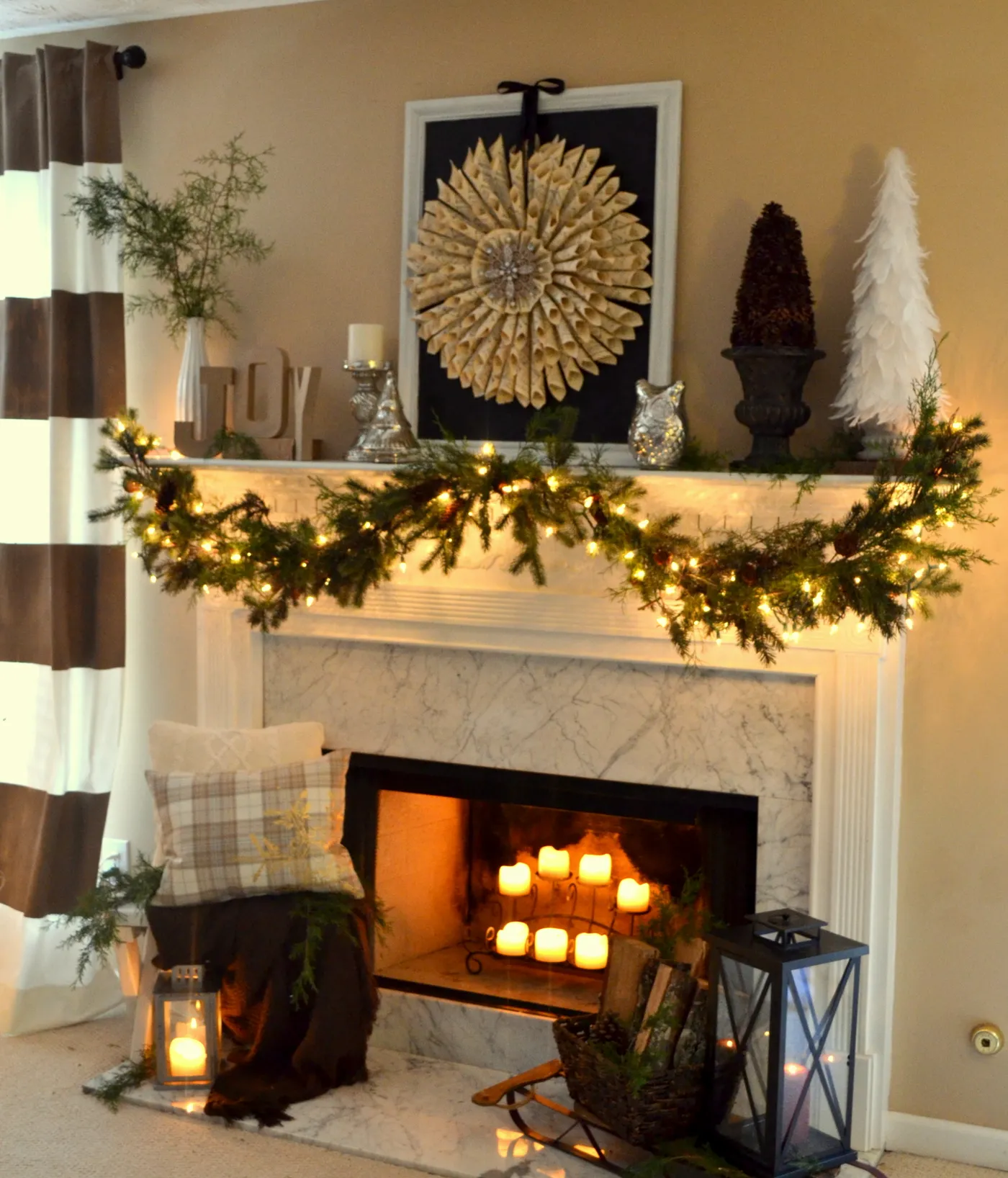 Red and festive Christmas mantel with DIY lit canvas