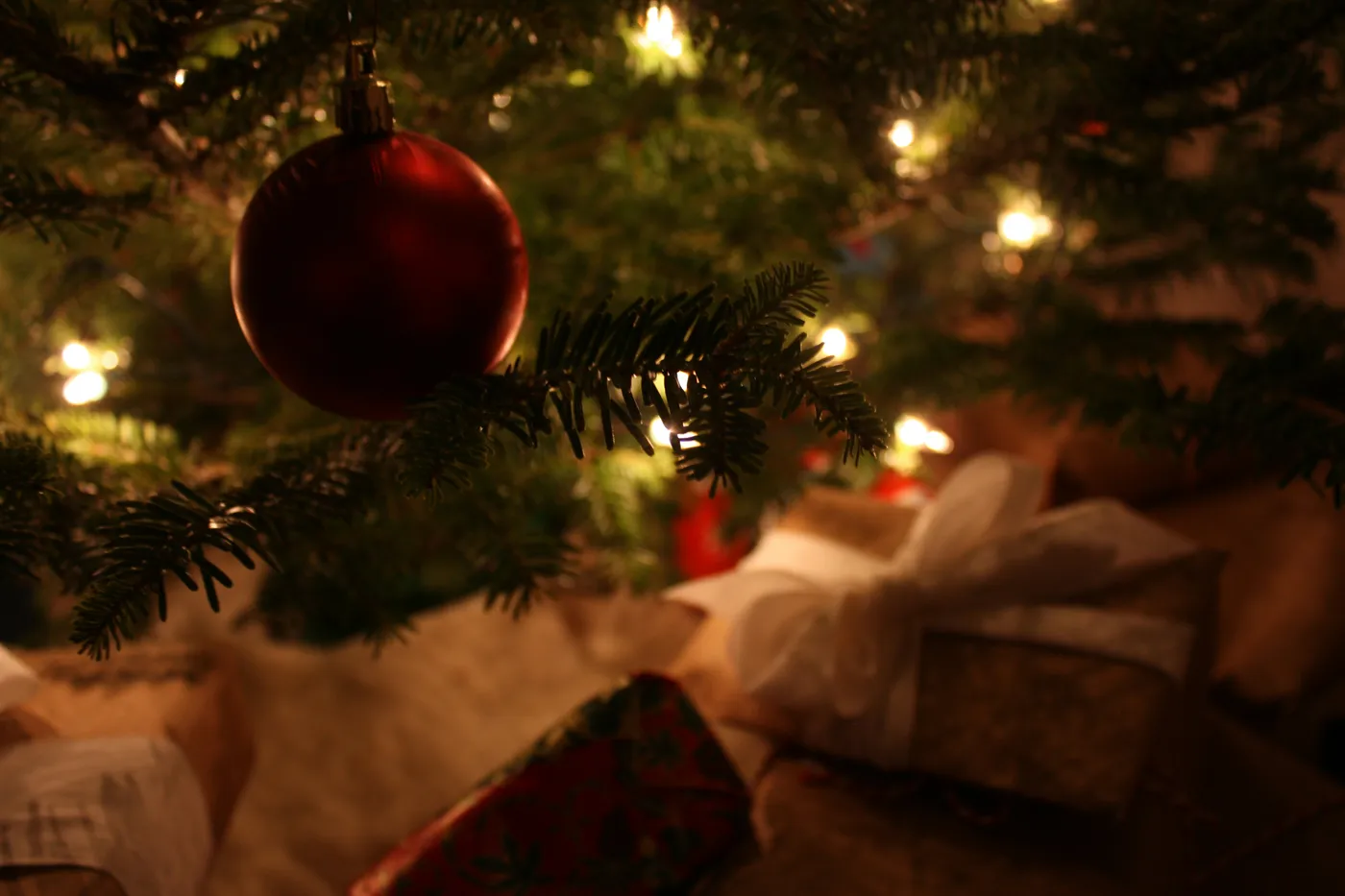 red baubles on green christmas tree