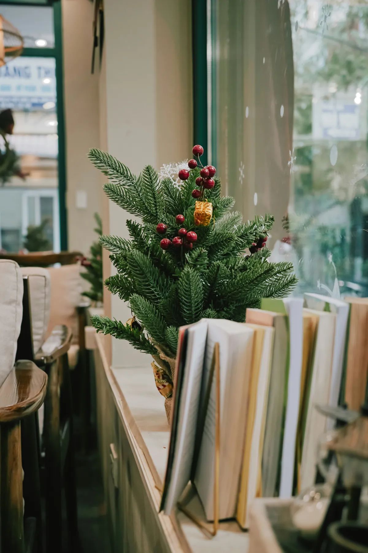 Small Christmas Tree in a Cozy Café Corner