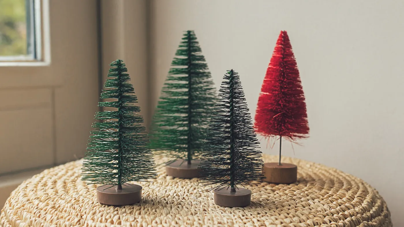 The Dollar Store Bottle Brush Christmas Tree DIY That'll Save You Big Bucks